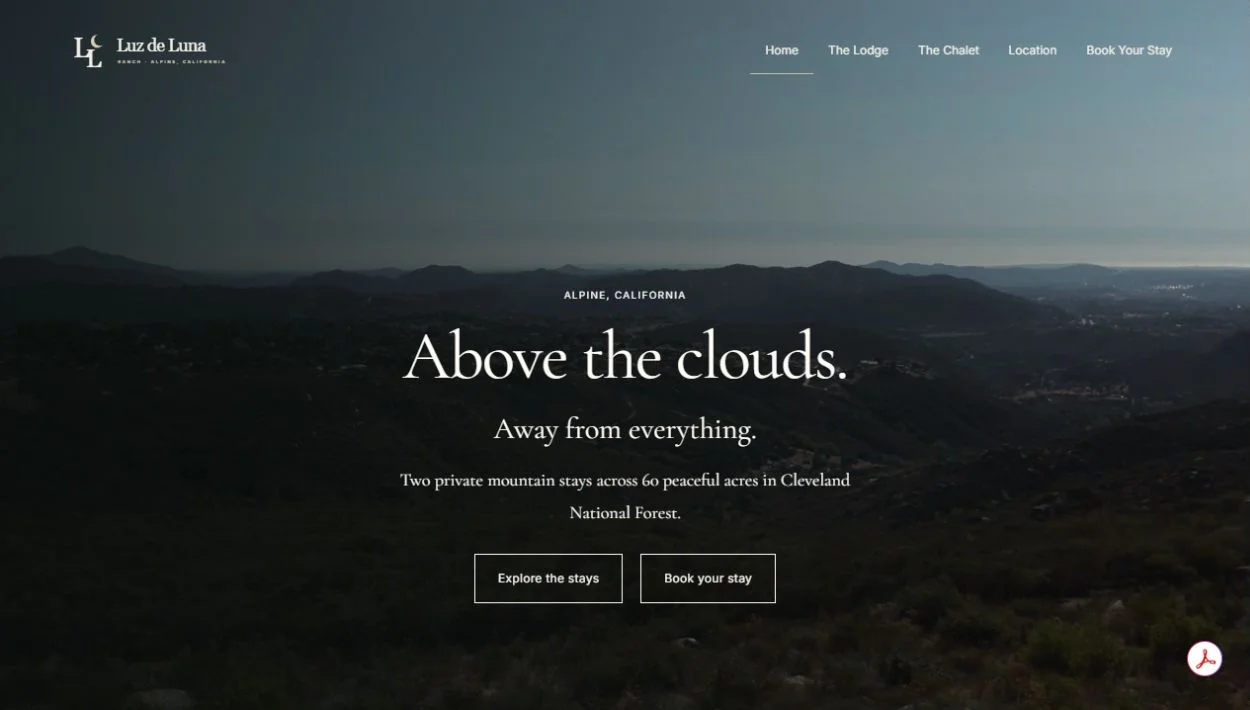 Luz de Luna Ranch website with cinematic mountain landscape and stay booking entry points